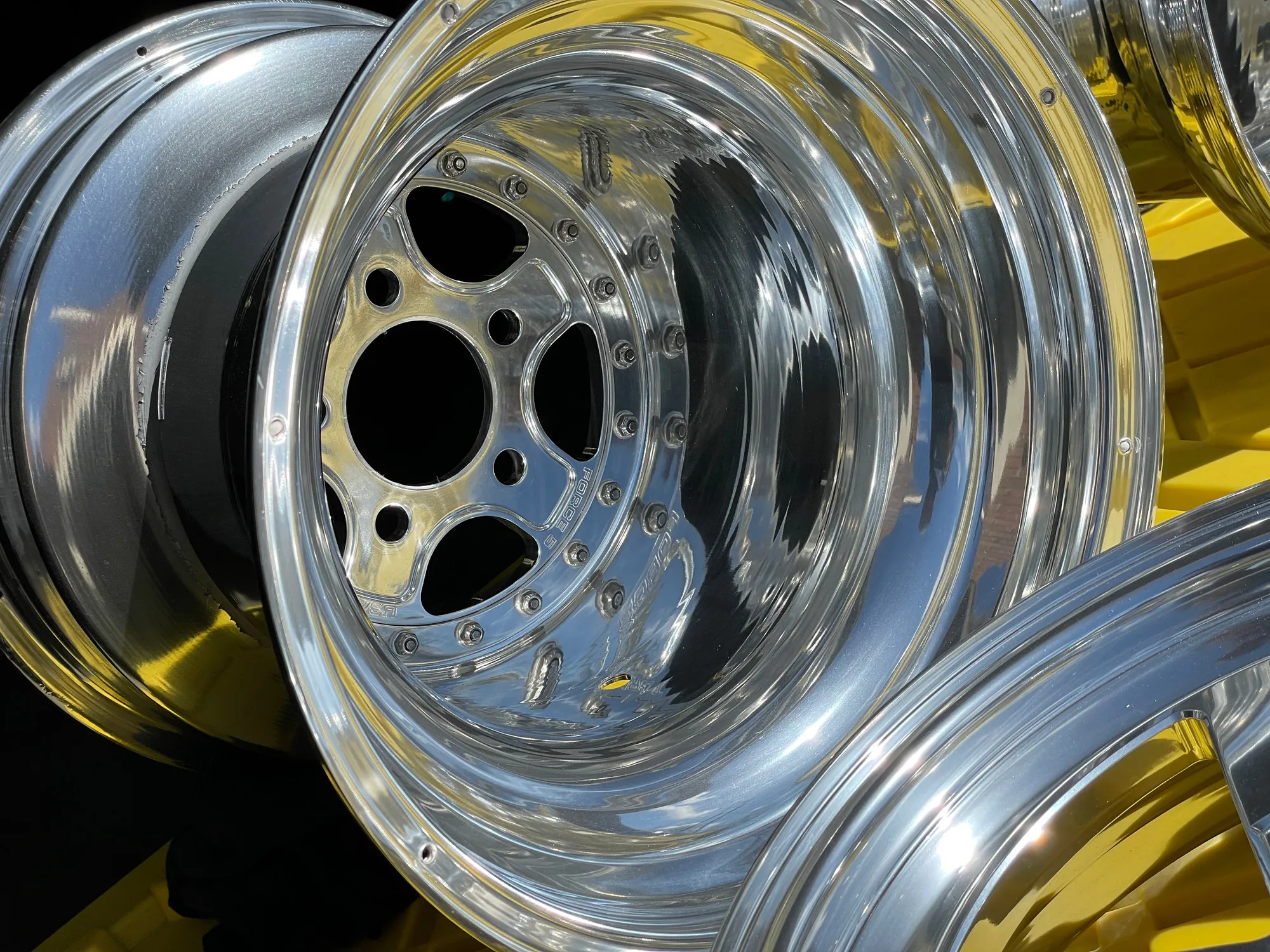 Polished multi-piece racing wheels